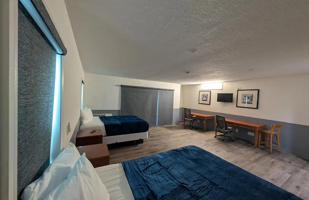 Clean and spacious guest room at Mirror Motel
